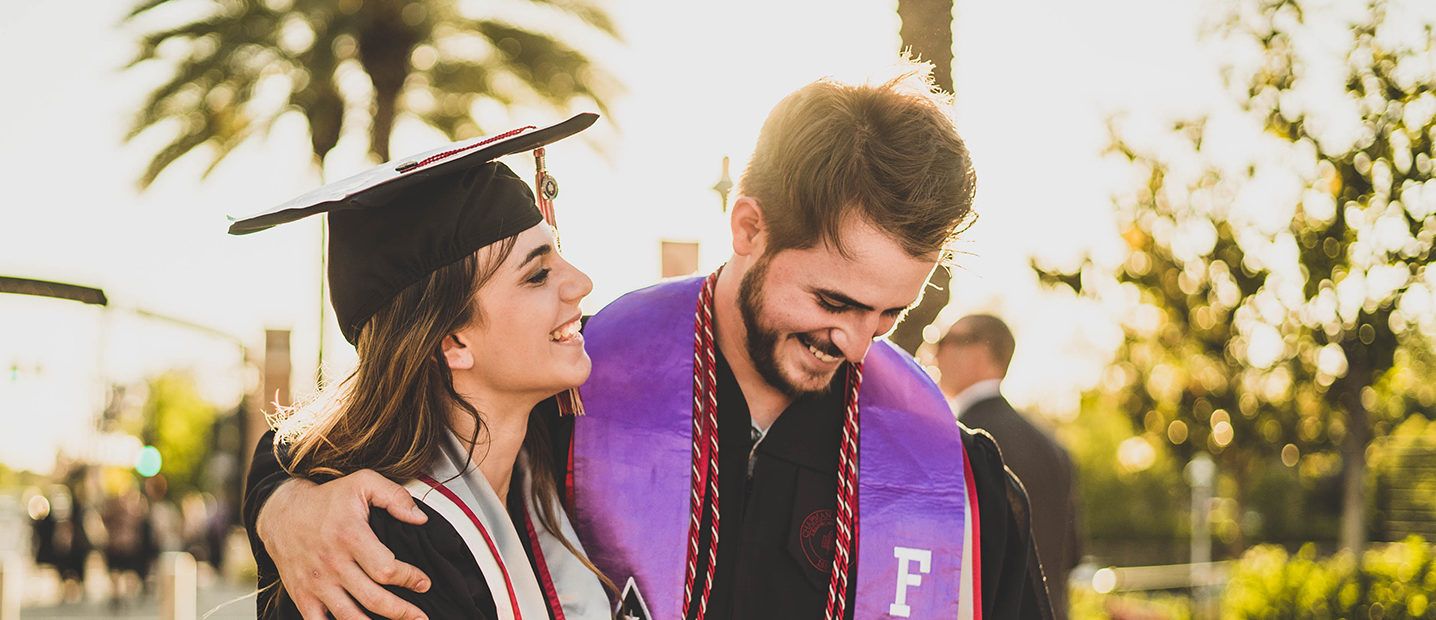 two college graduates